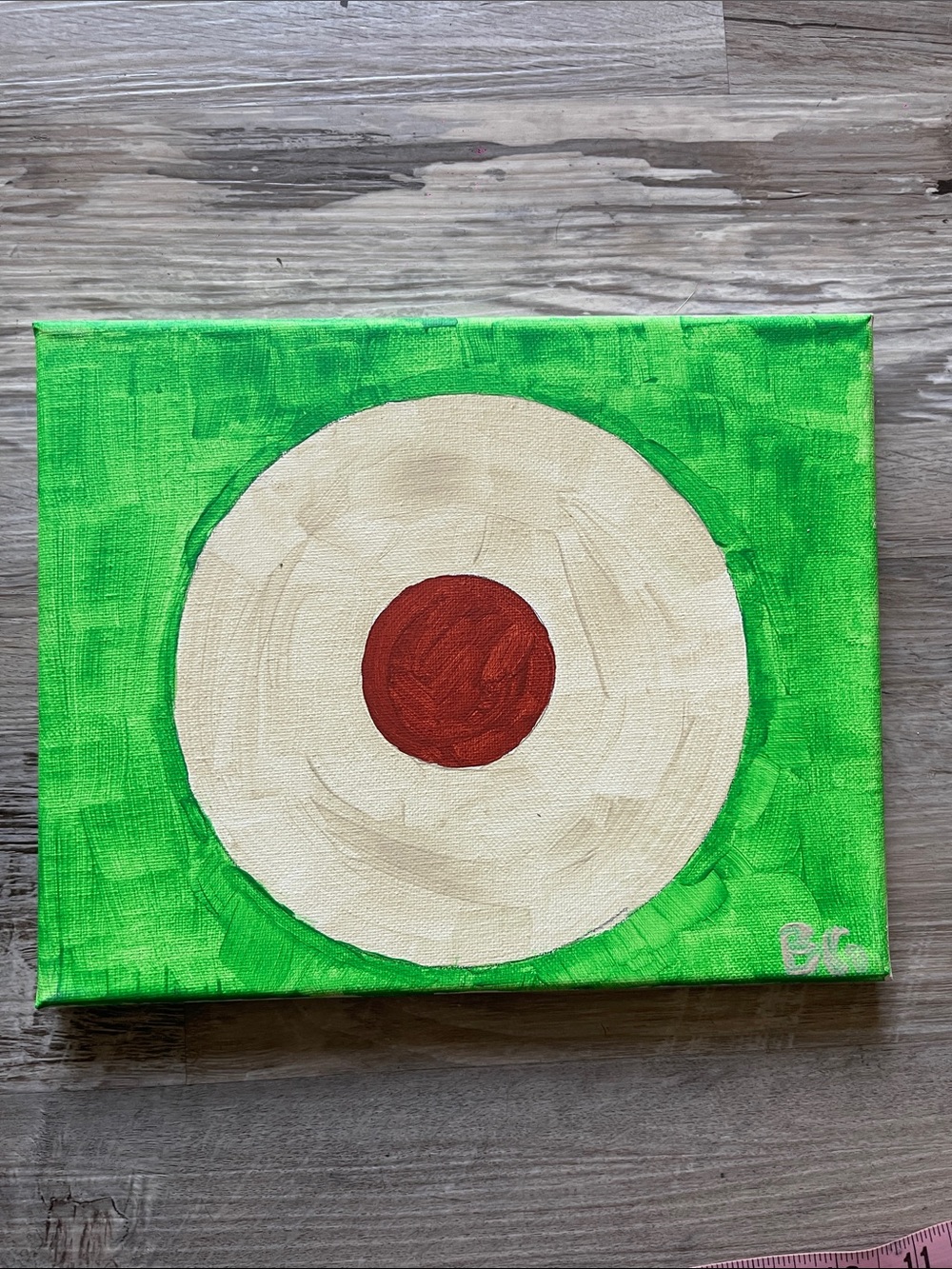 Abstract Green Canvas Wall Art with Cream and Red Bullseye